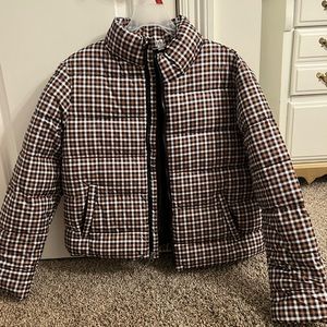 Never worn patterned puffer jacket. Size medium but could fit a small also!